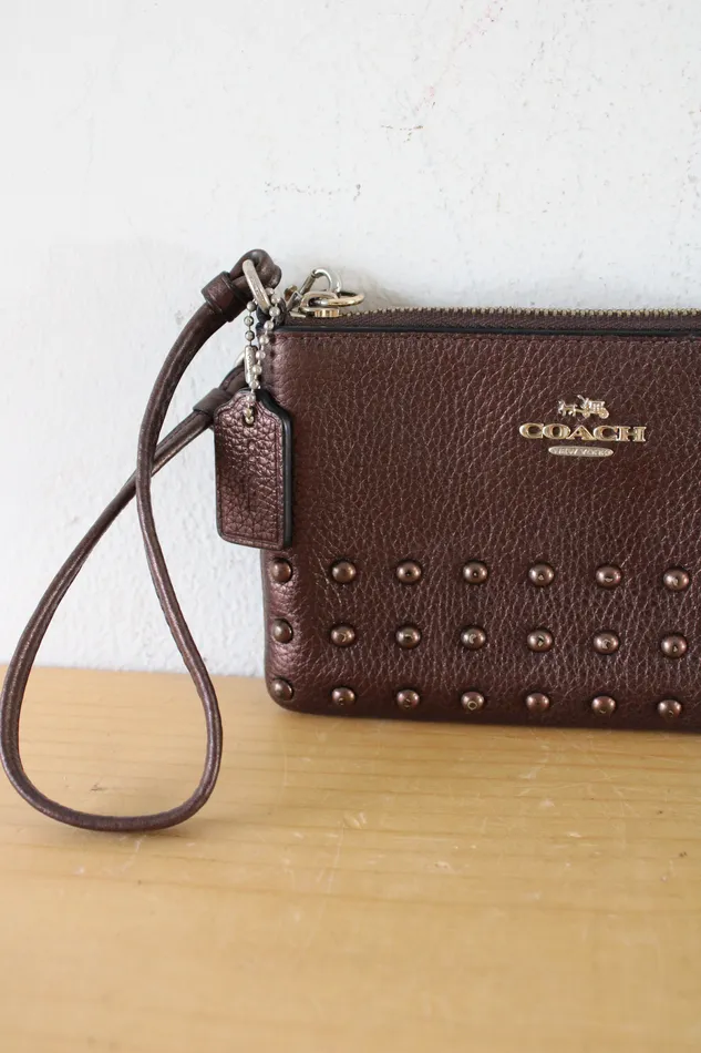 Coach Earrings Coach Bronze Studded Wristlet