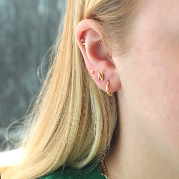 Earrings Kris Nations Twisted Hinged Huggie Hoop Earrings